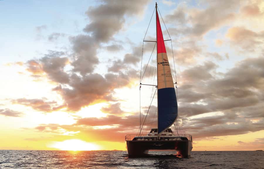 Fiji: Captain Cook Cruises Sunset Dinner Cruise - The boat setup: deck views and an indoor cabin