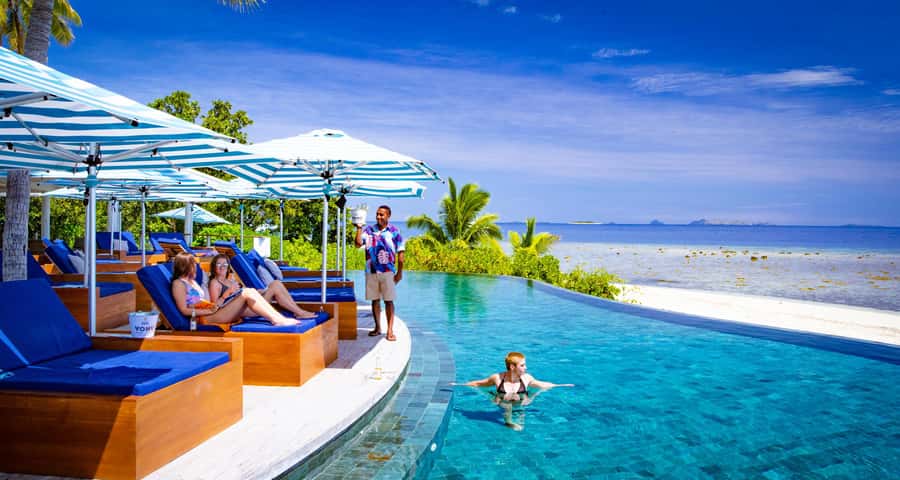 Fiji: Malamala Beach Club Private Island Day Pass & Transfer - Beach chairs, pool water, and paid comfort