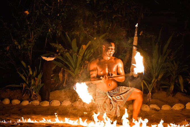 Sunset Cruise with Dinner and Fire Show - Arriving to songs, kava, and island traditions